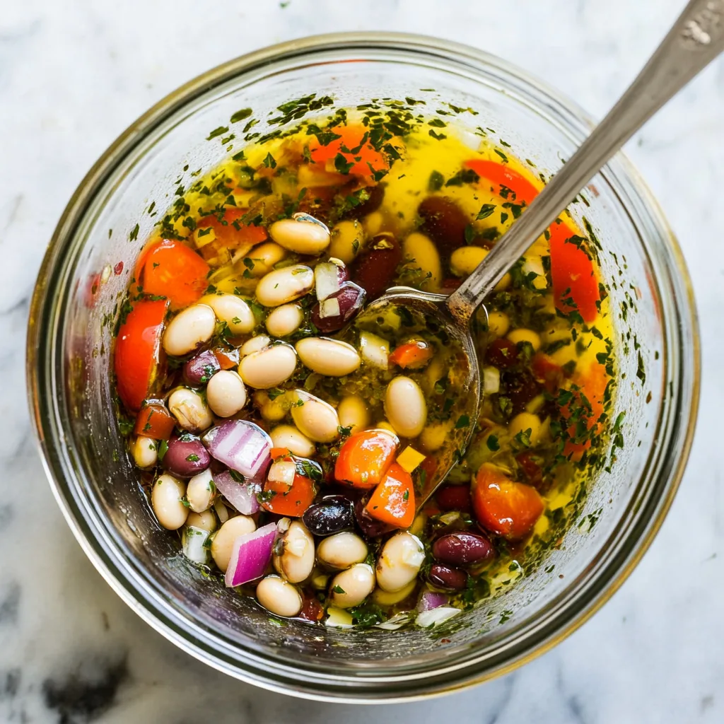 Preparing Italian dressing for bean salad